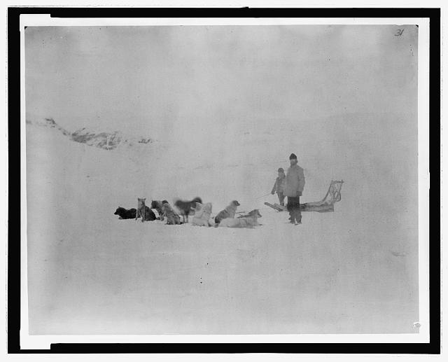 Lieutenant Adolphus W. Greely (right), leader of the Lady Franklin Bay Expedition, with the Inuit hunter Jens and a dog team at Discovery Harbor, October 1881. Library of Congress, LC-USZ62-136196.